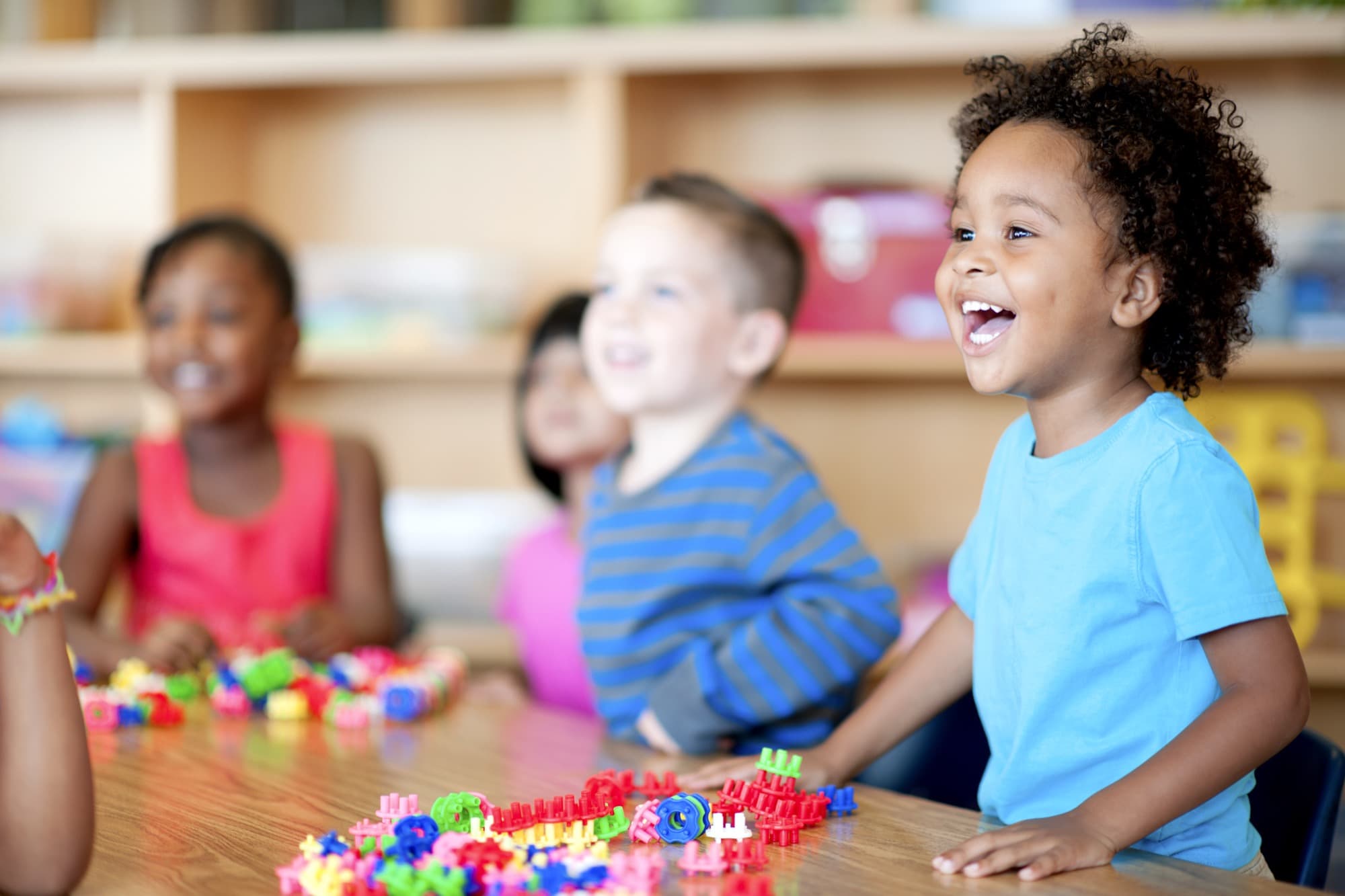 Children playing and learning at preschool