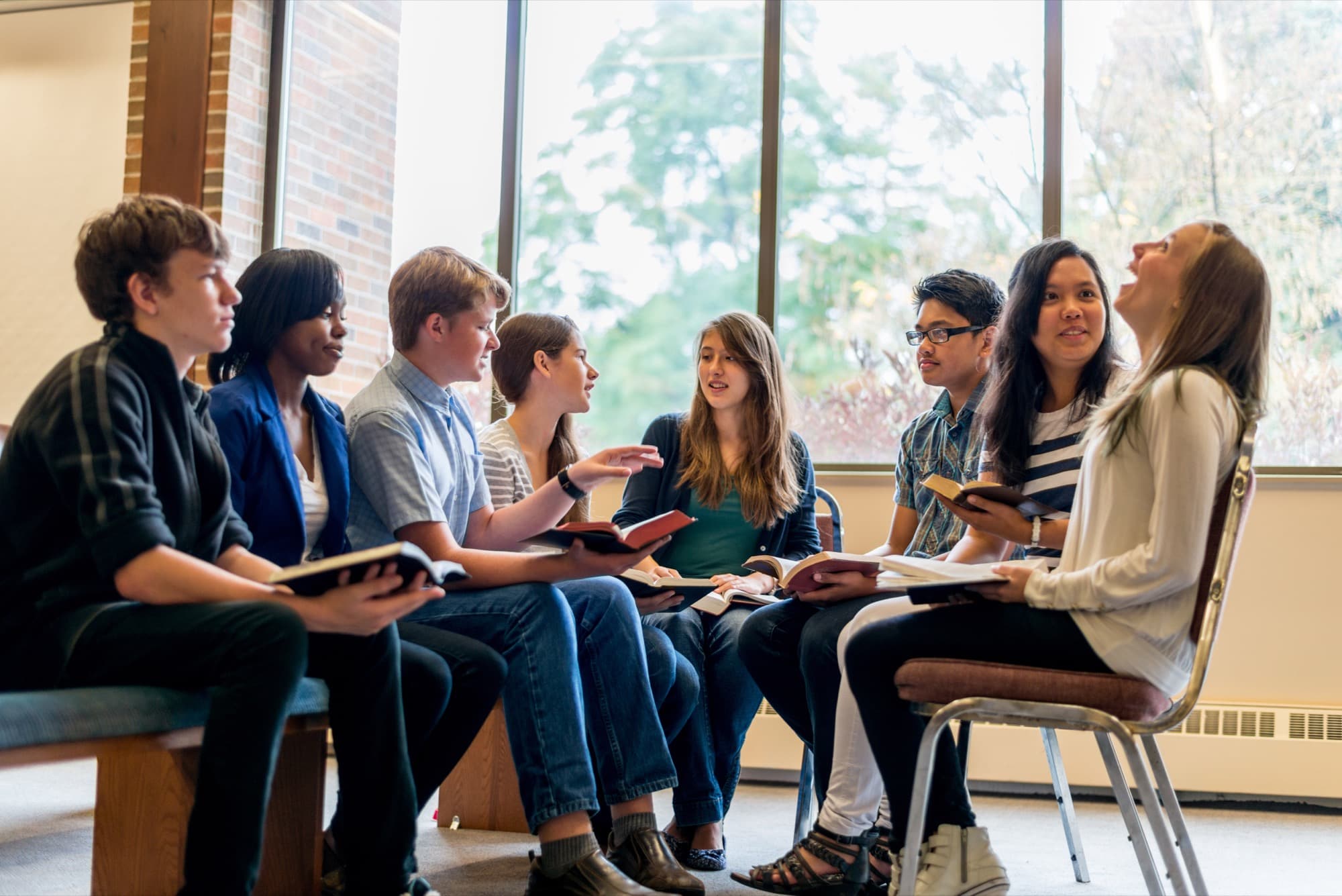 A small group studying the Bible together